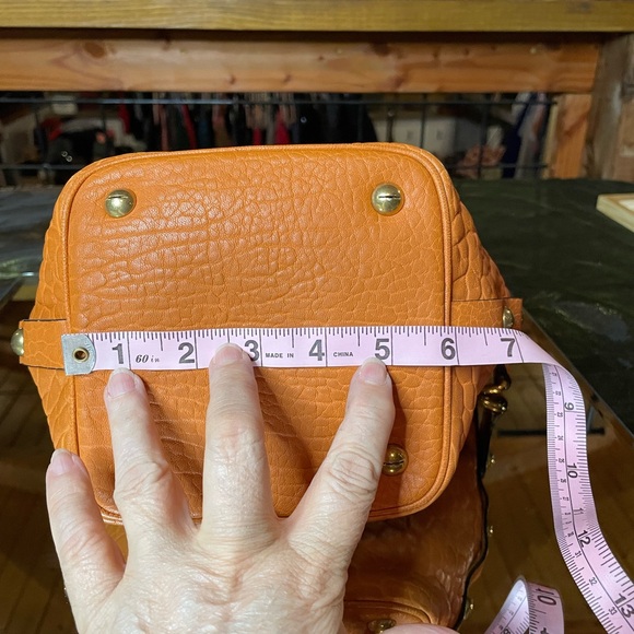 Christian Dior orange embossed leather handbag with pouch - Picture 10 of 16